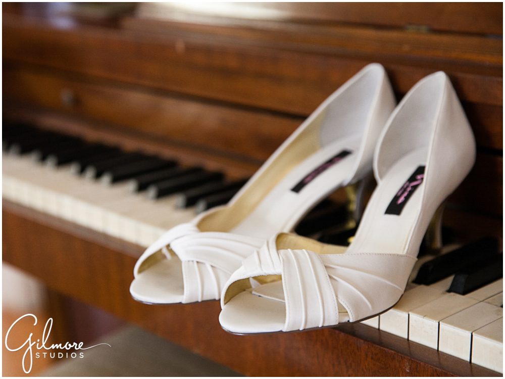 Nina white wedding shoes on piano keys