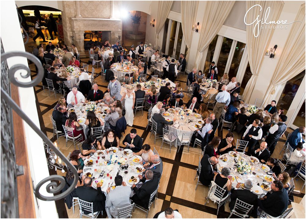 Indoor ballroom wedding reception, dining room, tables, wedding decor