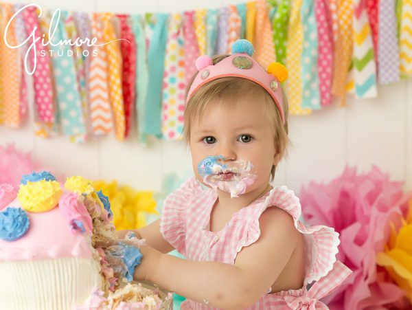 1 year old girl's birthday cake portrait session