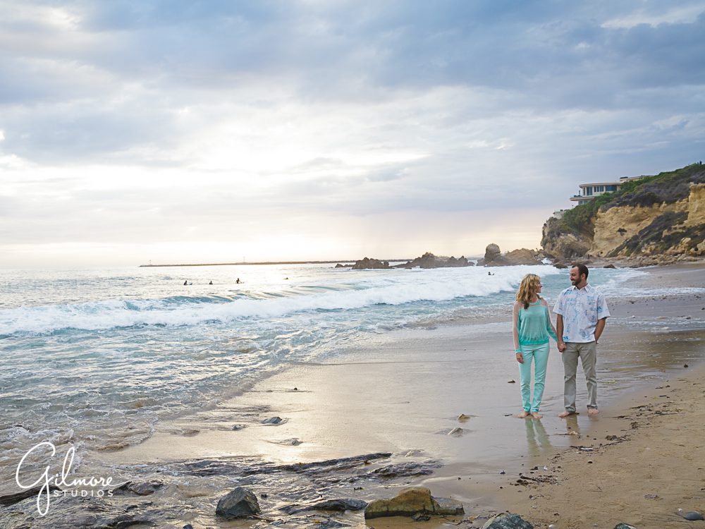 walking on the beach, Corona Del Mar Engagement session