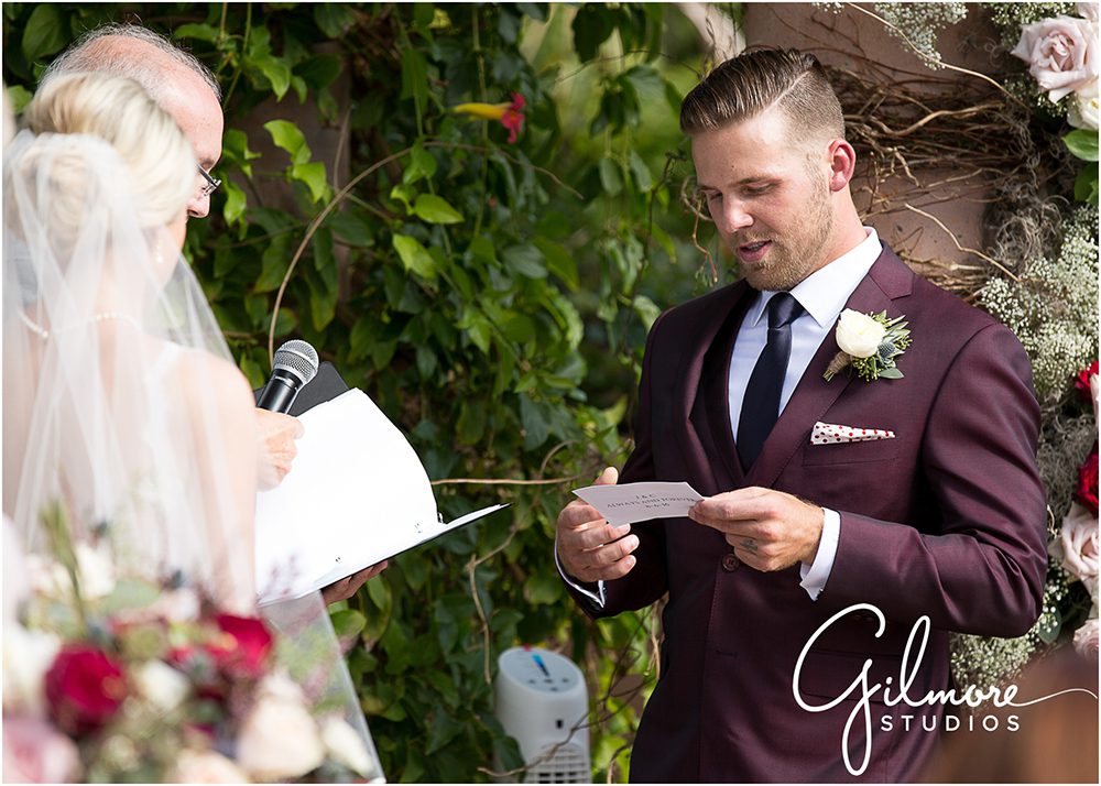 groom reads his vows to the bride, wedding ceremony, San Diego photographer