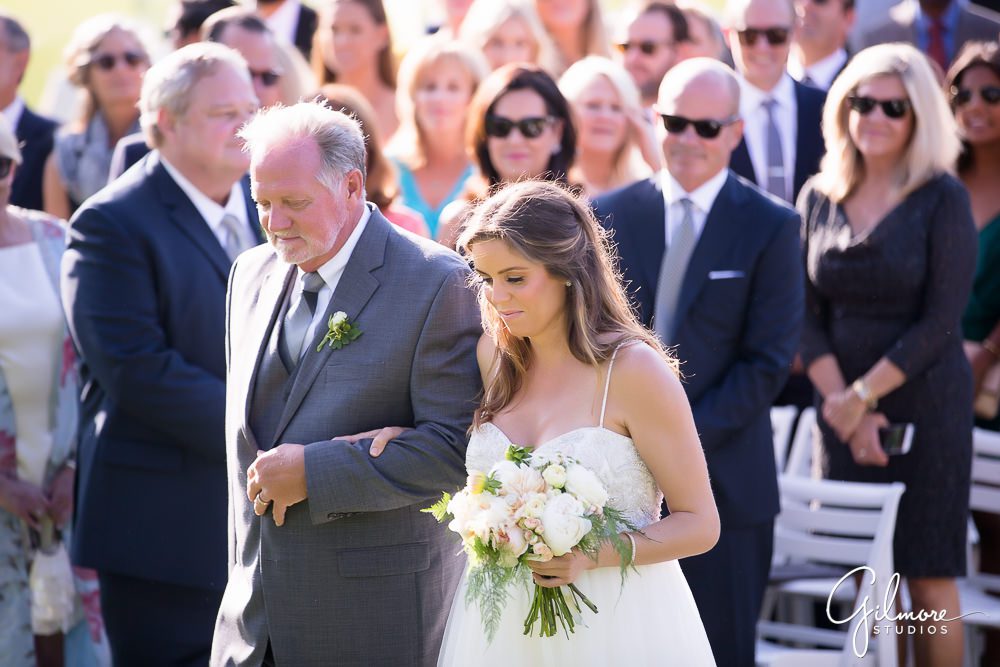 father walks the bride down the aisle