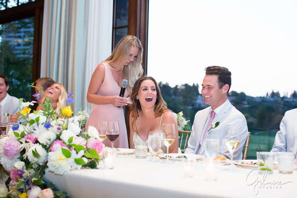 maid of honor toasts the new married couple