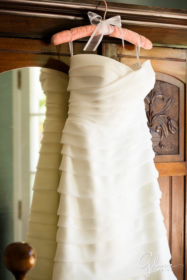 The bride's Arie Barcelona dress hanging up before the wedding