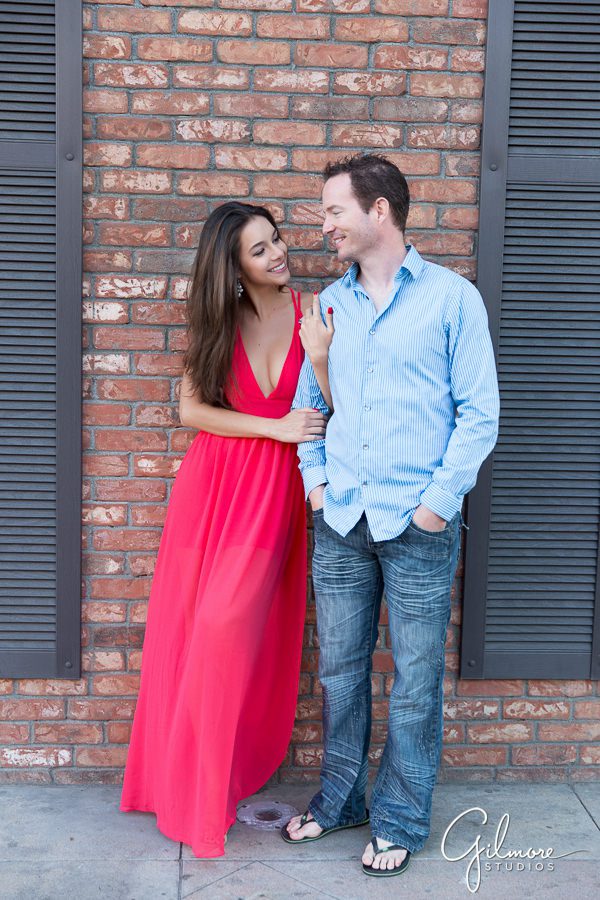 Engagement session on brick wall in HB