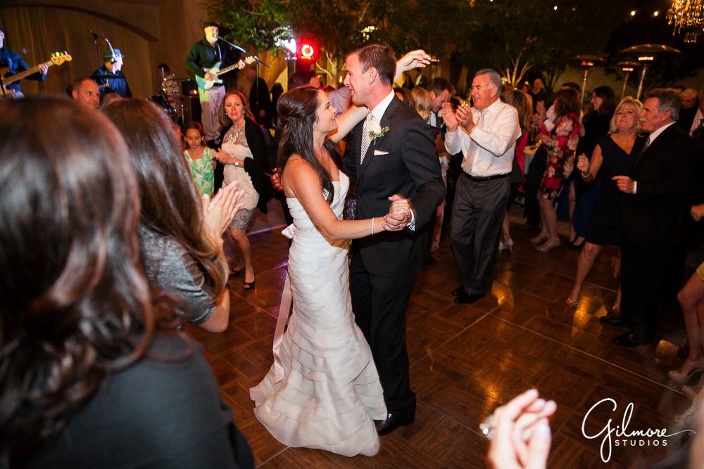 bride and groom dancing at Serra Plaza