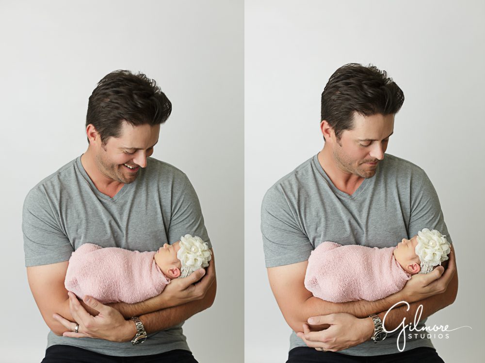 daddy holding his new baby girl