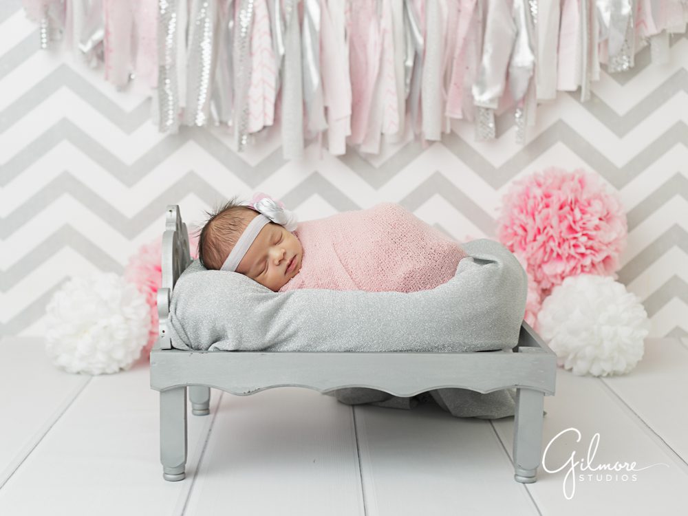 pink, grey, silver, and white newborn studio props