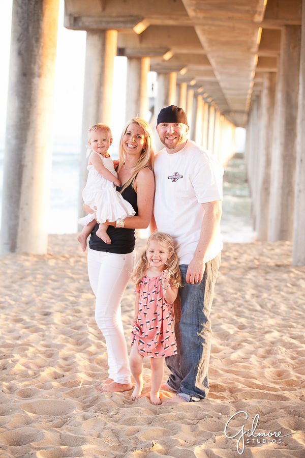 family photo under the Huntington Beach pier