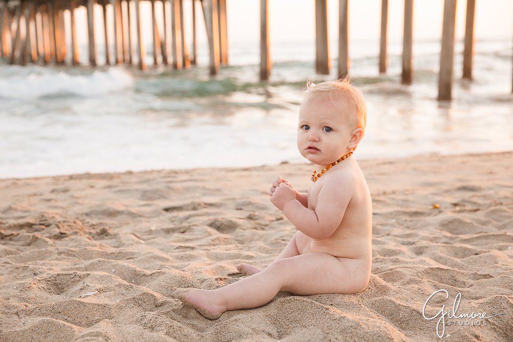 baby sitting by the Huntington Beach pier