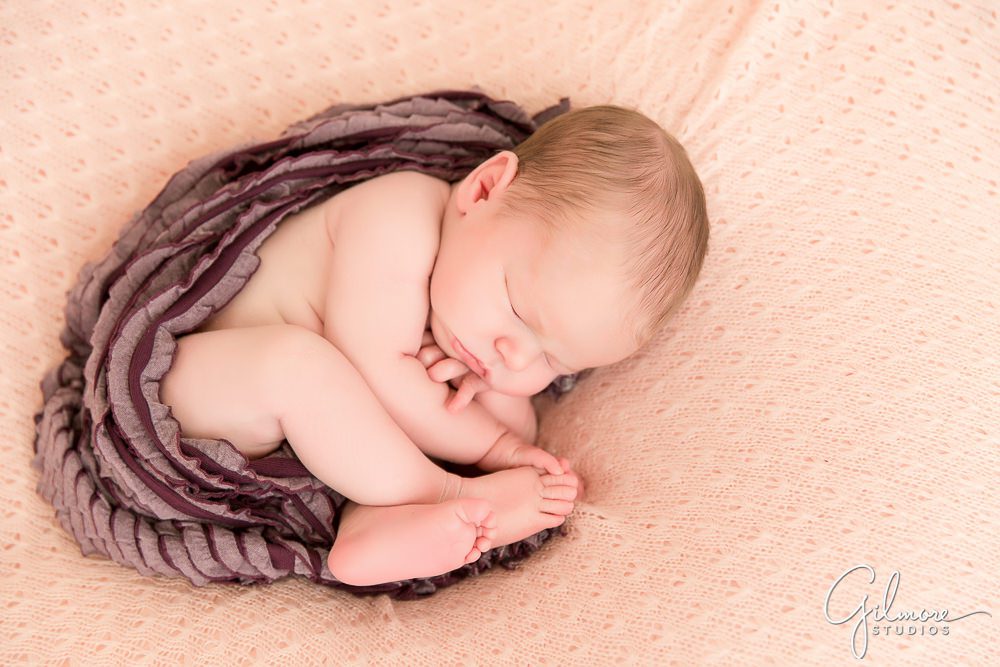sleepy newborn baby portraits in Newport Beach
