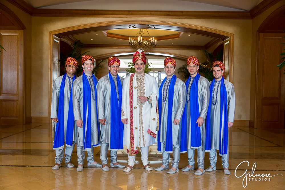 caucasian indian groom and groomsmen wearing traditional Indian wedding attire