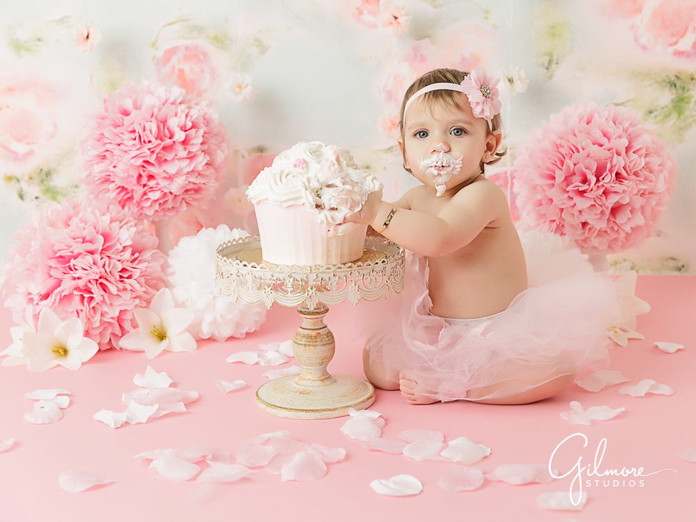 adorable girl's first birthday cake smash photo