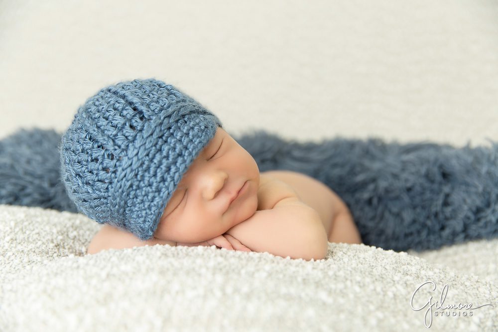 blue knitted cap for a newborn boy