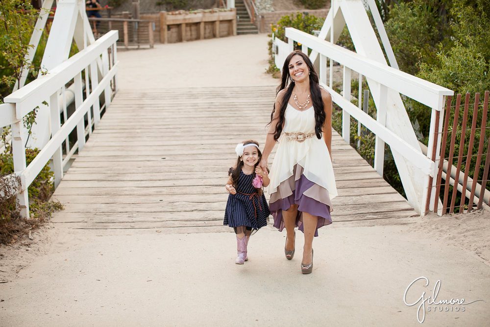 rustic wooden bridge leading to the cottages, Crystal Cove family photographer