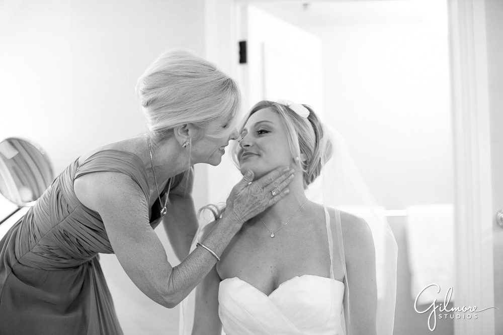 bride and her mom getting ready for the wedding