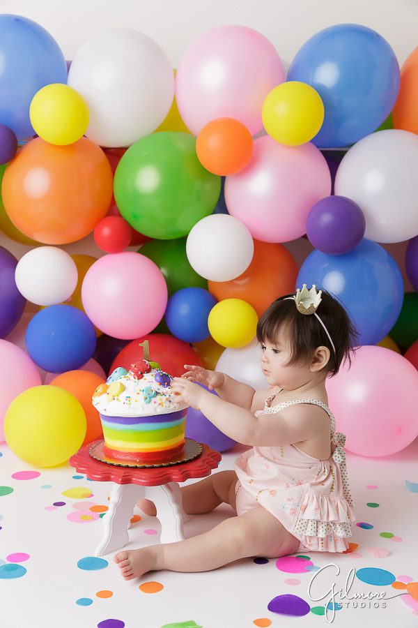 1st birthday cake smash - rainbow balloons