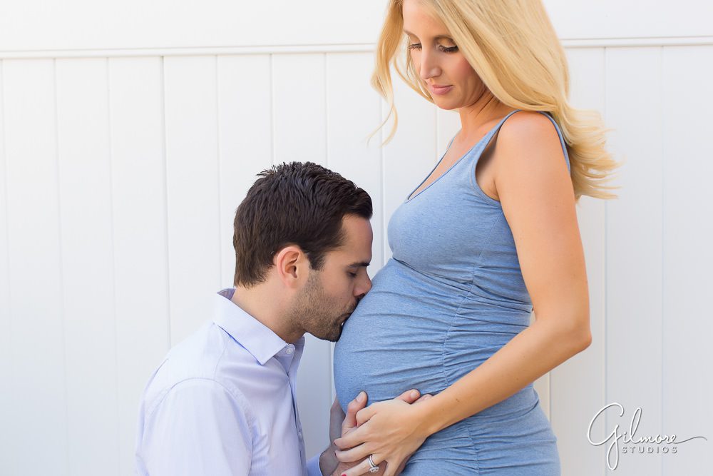 kissing mom's baby bump, Lifestyle Maternity Photographer