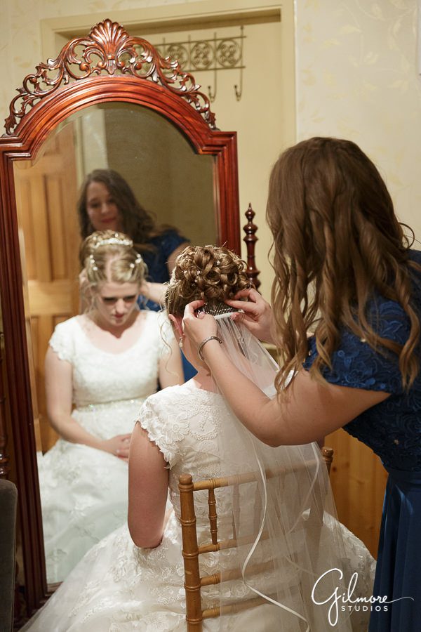 bride preparing for the wedding, white dress and veil