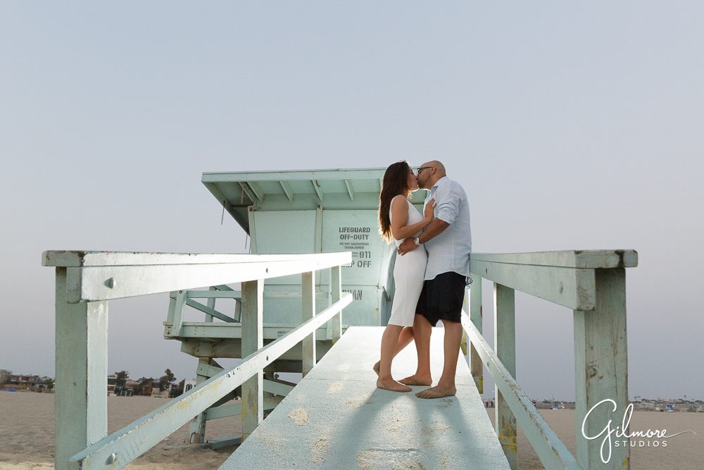 Couple standing on the lifeguard stand in Venice Beach, CA