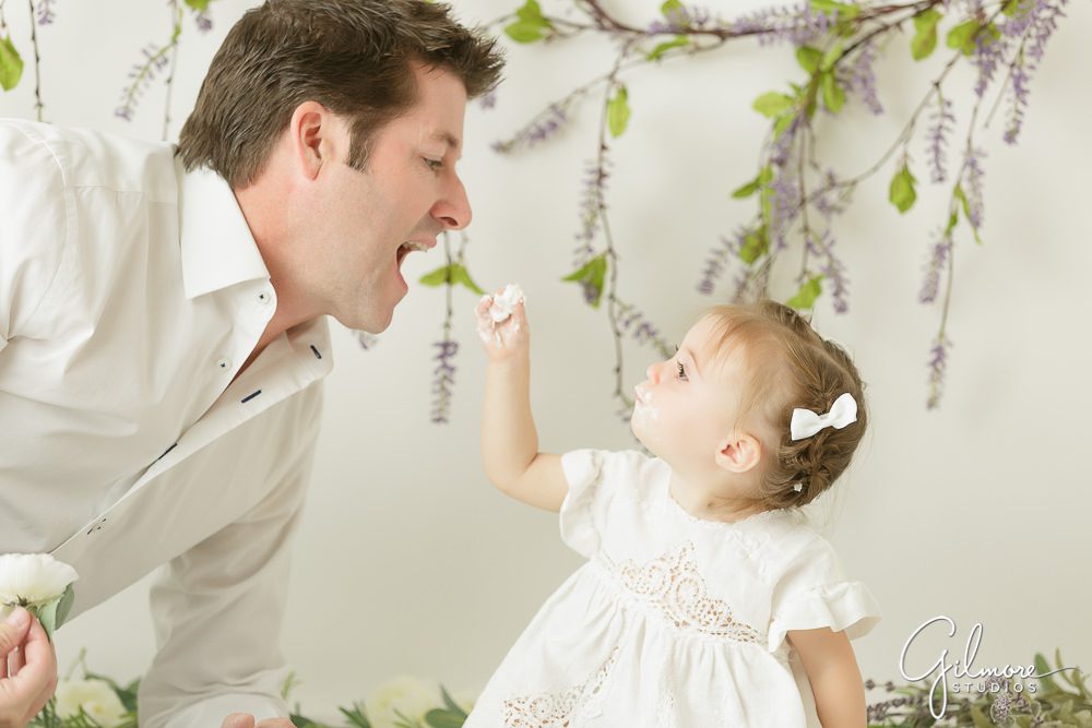 one year old feeds her daddy, Smash Cake Photo Session