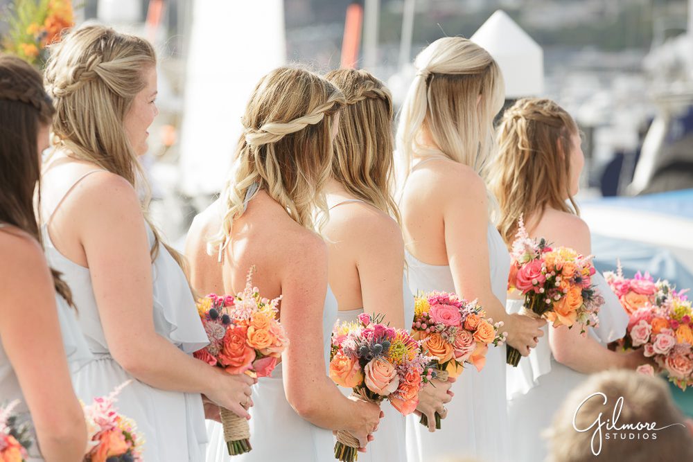bridesmaids line up for the ceremony, Balboa Yacht Club Wedding Photographer