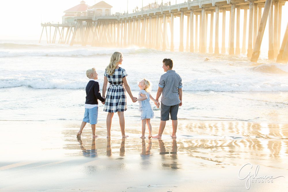 brothers and sisters playing on the sand, HB family photographer