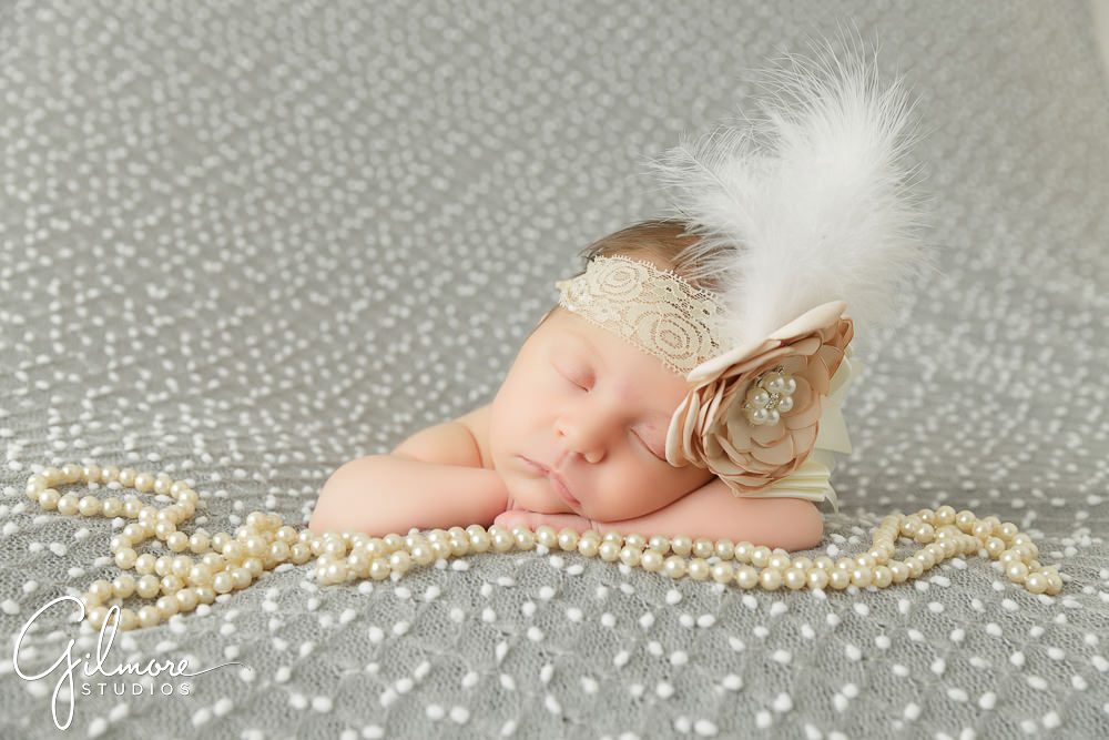 Newborn Family Portrait Photography, white feather, pearls, baby session props