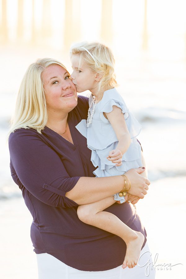 mother and daughter kiss, beach photography, family, children, Orange County