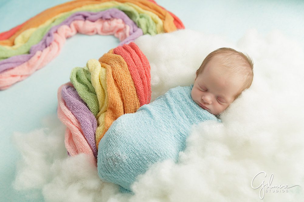 Rainbow and clouds props for a newborn baby photography session