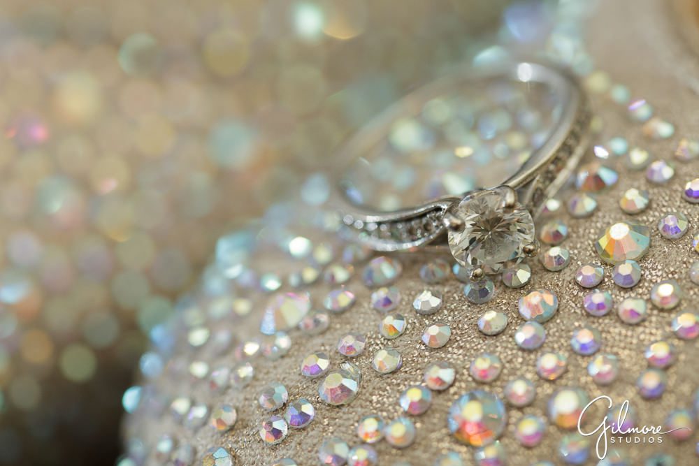 pretty ring shot on the bride's shoes