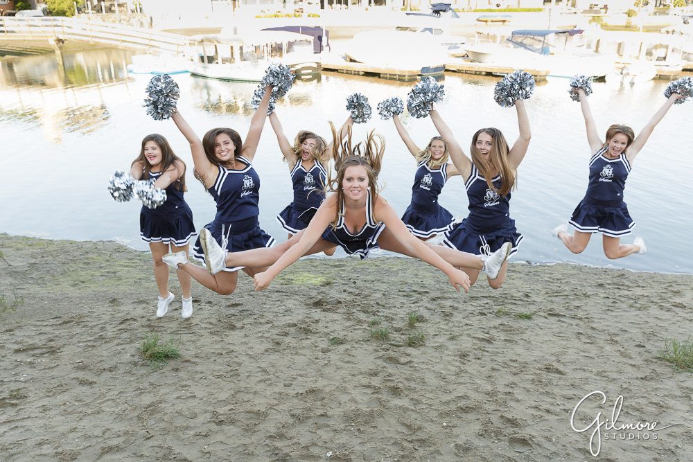 cheerleaders, cheer squad photographer, cheer team photography, pom poms, jumping, candid pose