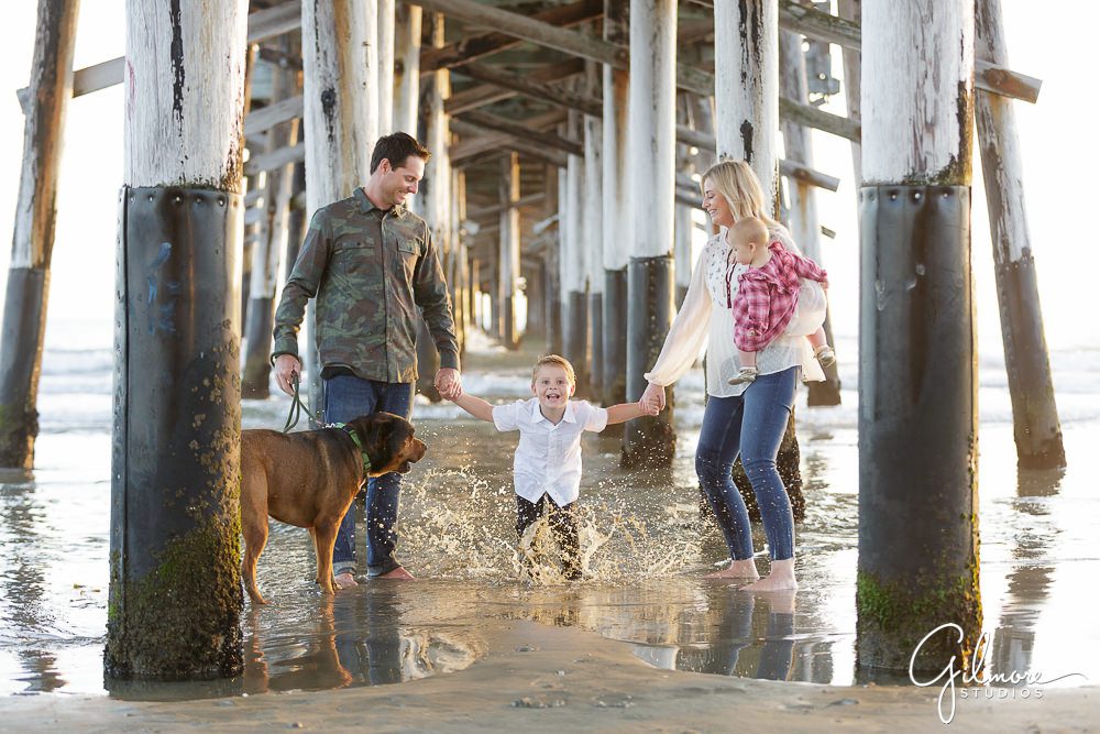 splashing in the ocean, under pier, Newport Beach Pier Family Portrait