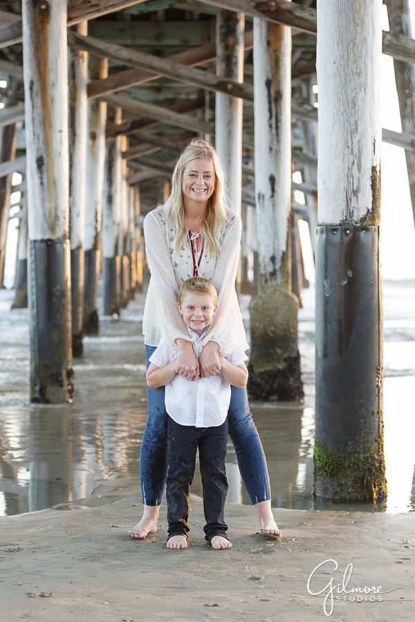 posing, mom and kids, Newport Beach Family Portrait, under the pier
