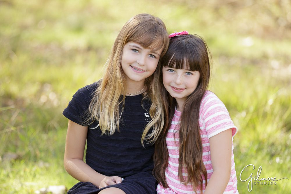 sisters, navy blue dress, pink stripes, Orange County Family Portrait Photographer