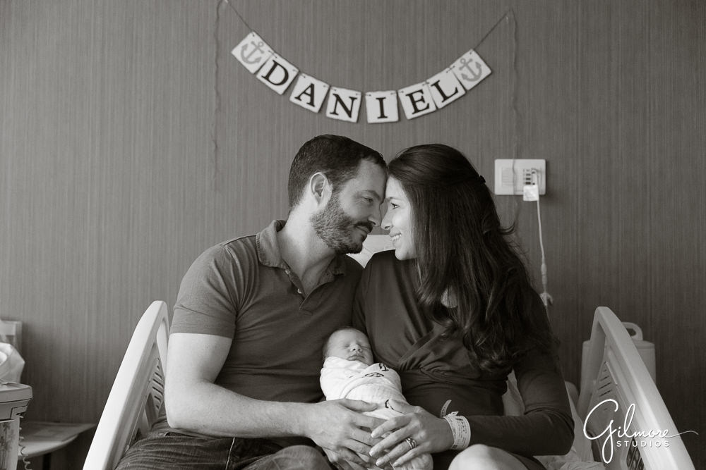 mom and dad get together with their brand new son, Fresh 48 Newborn photography