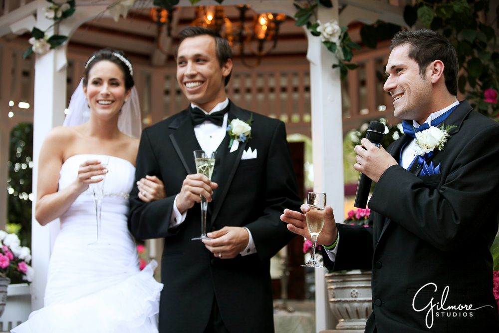 Tivoli Terrace Wedding, toasting their guests, Laguna Beach photographer