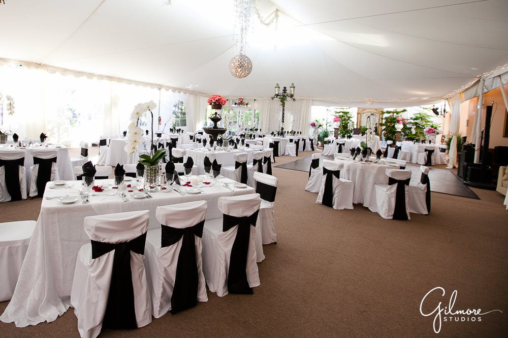inside the reception tent, Tivoli Too Wedding, white linens, black chair bows, classic wedding decor