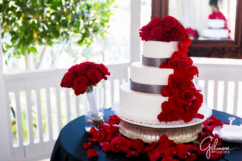 Tivoli Terrace Wedding, red roses, 3 tier wedding cake, rose petals