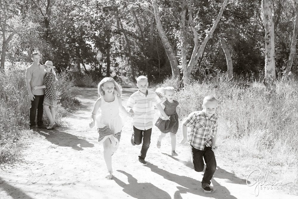 candid family photo, Laguna Beach Family Photographer, kids running, Orange County