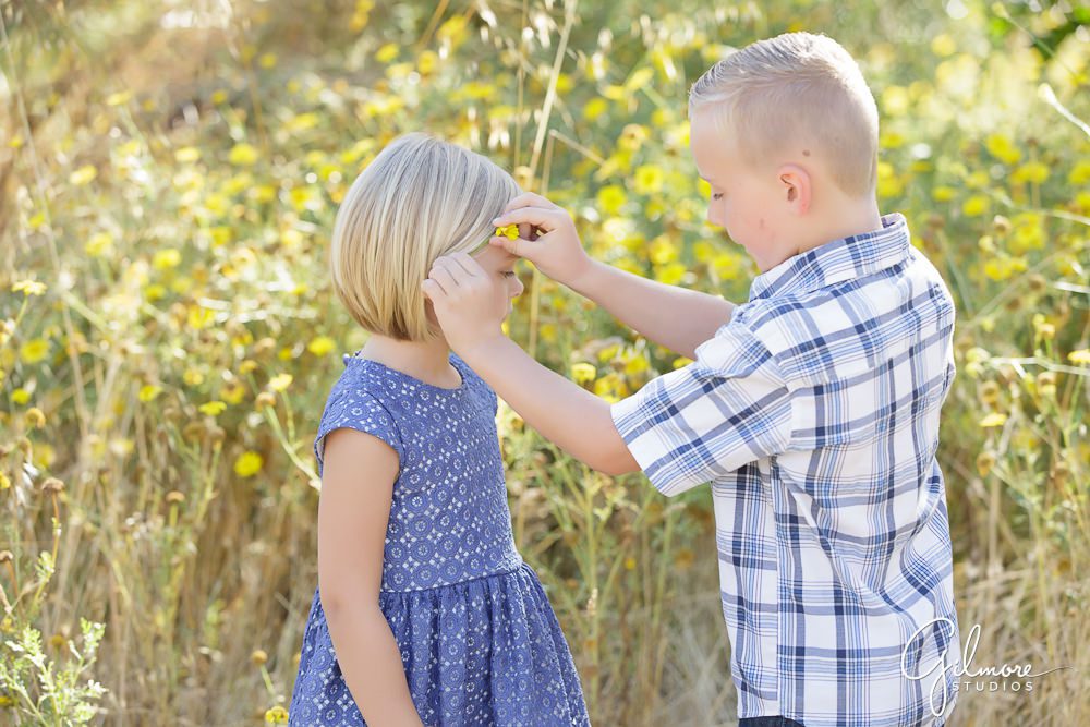 cute moment, siblings, brother and baby sister, Laguna Beach Family Photographer
