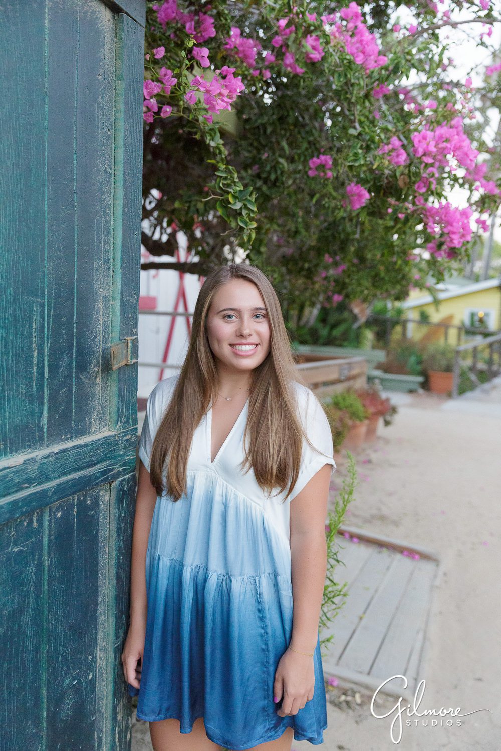 Senior portrait at the Crystal Cove cottages, State Park, Newport Beach
