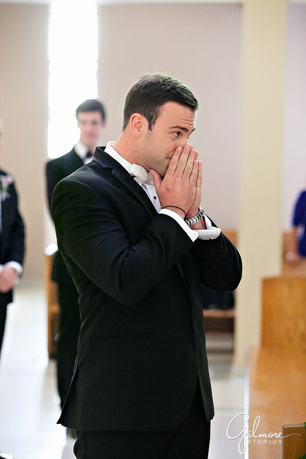 reaction from the groom seeing his bride for the first time, Air force wedding, Costa Mesa, St. Joachim's Church