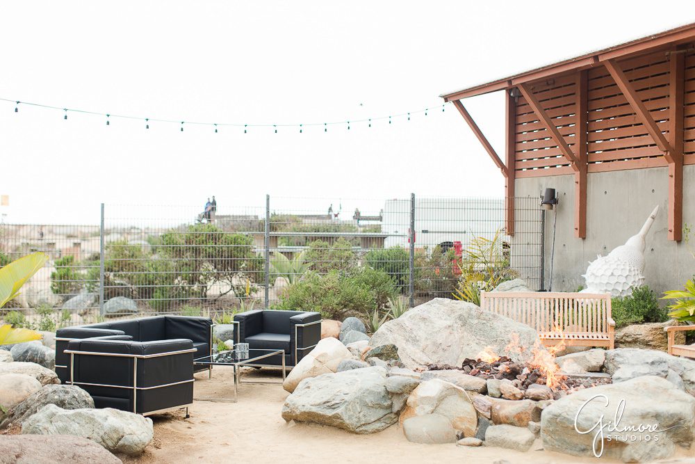 firepit, chairs, black chairs, glass table, outdoors, cocktail hour, wedding, wedding ocean institute, ocean institute wedding, dana point wedding photographer, outdoor wedding, wedding ideas, wedding inspiration, wedding decor, wedding decorations, outdoor wedding ideas