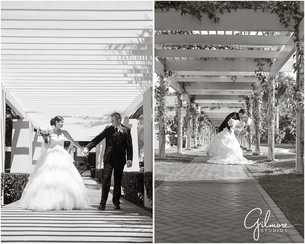 Hyatt Regency Newport Beach, bride, groom, dress, wedding, photographer, kiss, black and white photo, outdoor, portrait