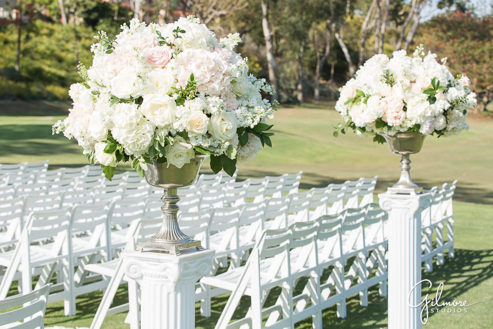 white wedding chairs, floral decor, ceremony, big canyon country club, site, venue
