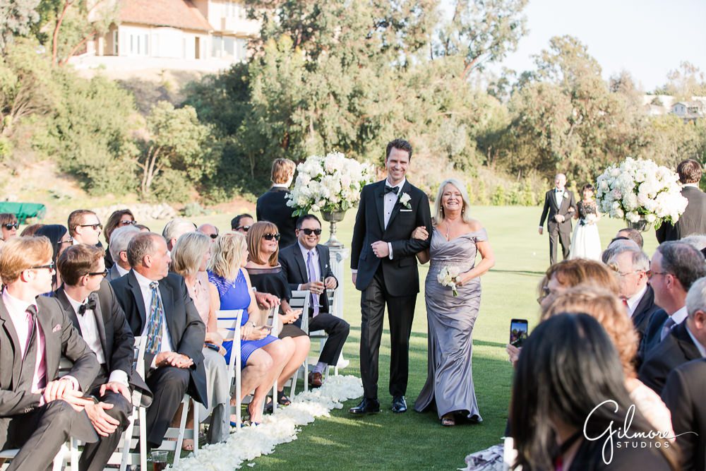 wedding ceremony, walking down the aisle, big canyon country club, wedding decor, guests, groom and mother