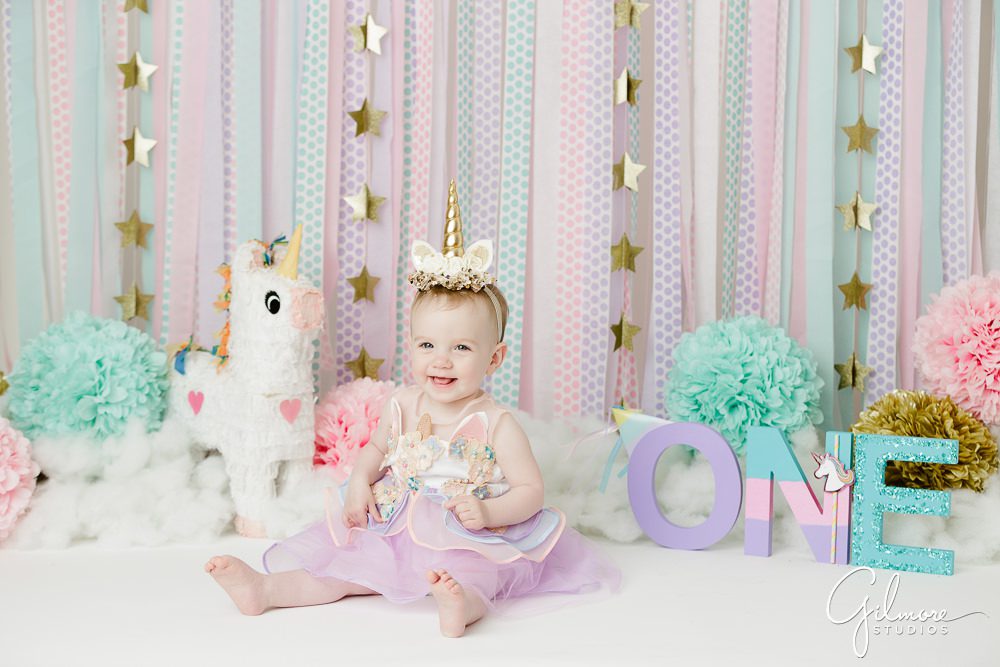 Unicorn Theme Cake Smash, baby girl, props, studio, photo shoot, portraits, session, pinata, outfit, headband