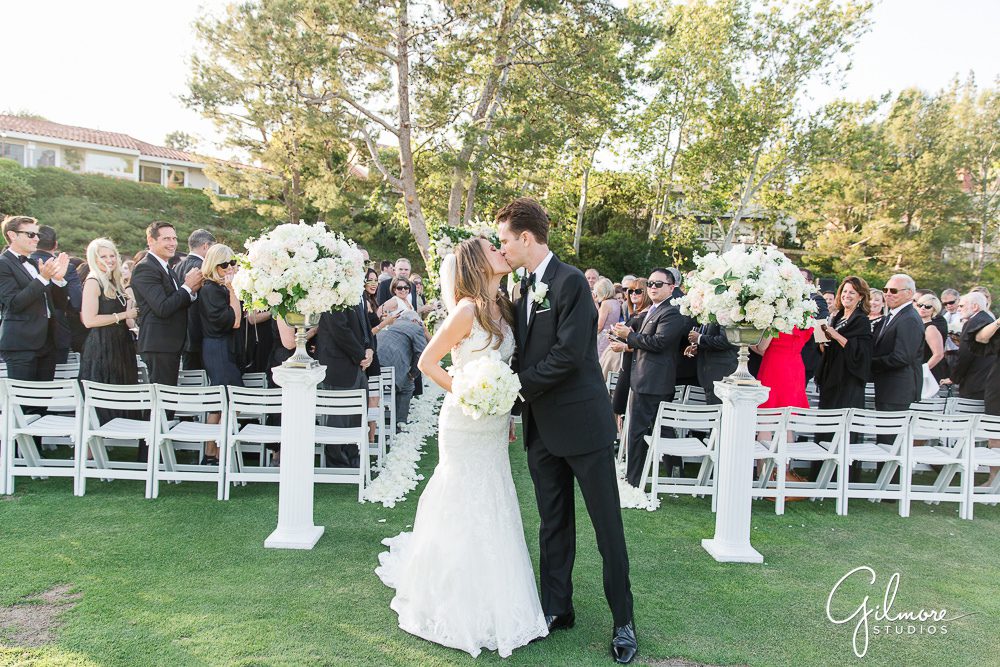 Newport Beach golf course wedding ceremony, big canyon country club, bride, groom kiss
