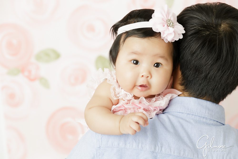 100 Days Baby Photography Session, dad, father, daughter, newborn, portrait session, hug, flower headband, floral backdrop